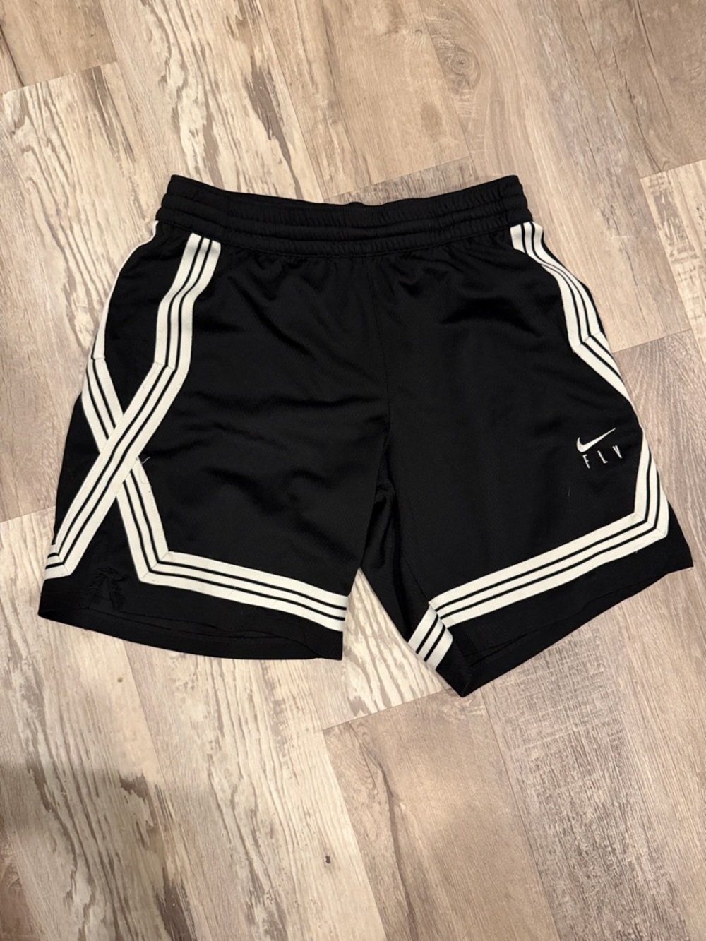 Nike Black Athletic Shorts with White Stripe Accents